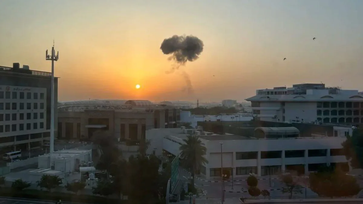 dubai situation now Sunset with smoke cloud in sky